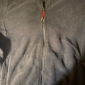 Original brand new  Ozark Trail Black Fleece Jacket with Orange Tag